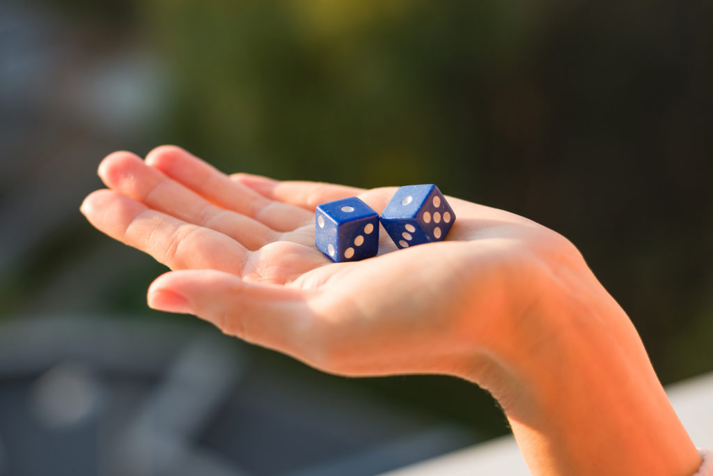 Two dice in hand