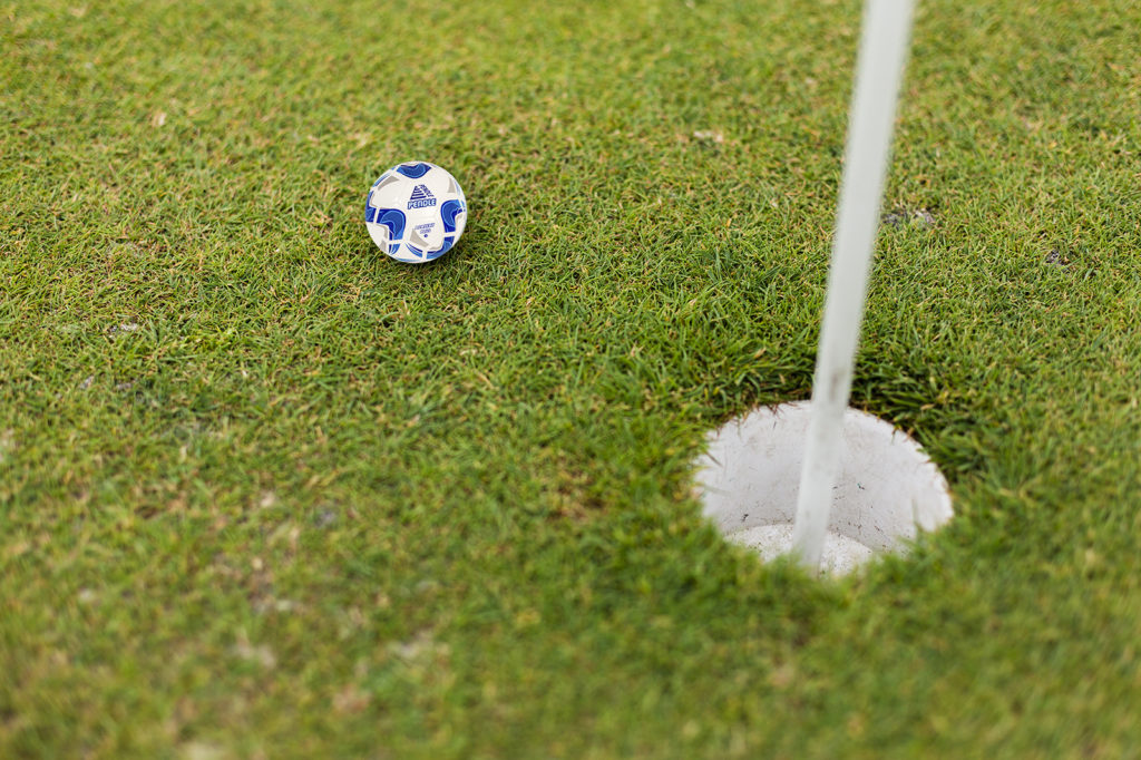 Pendle football near a golf hole