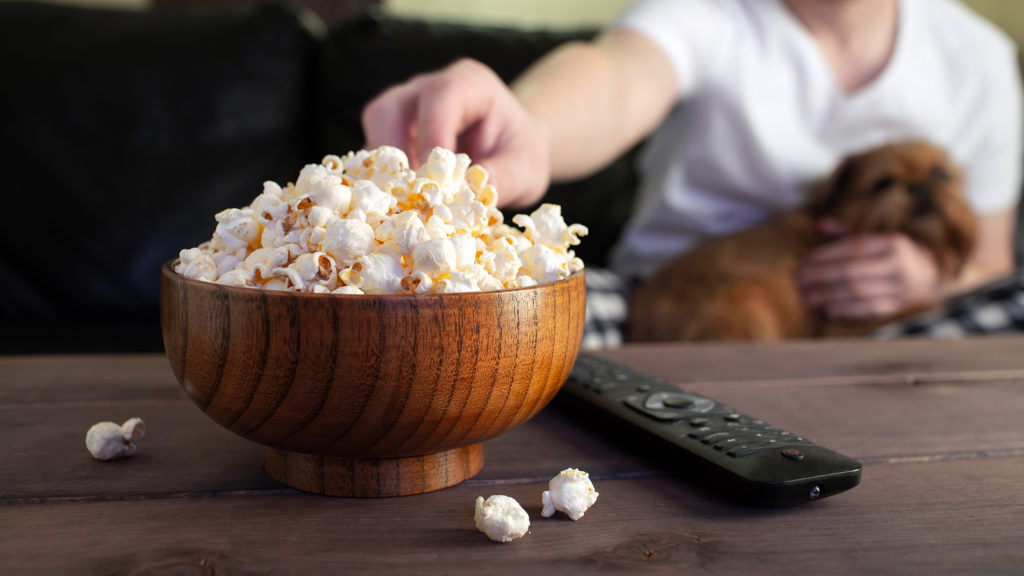 Top Football Documentaries to Stream Eating popcorn whilst watching popcorn