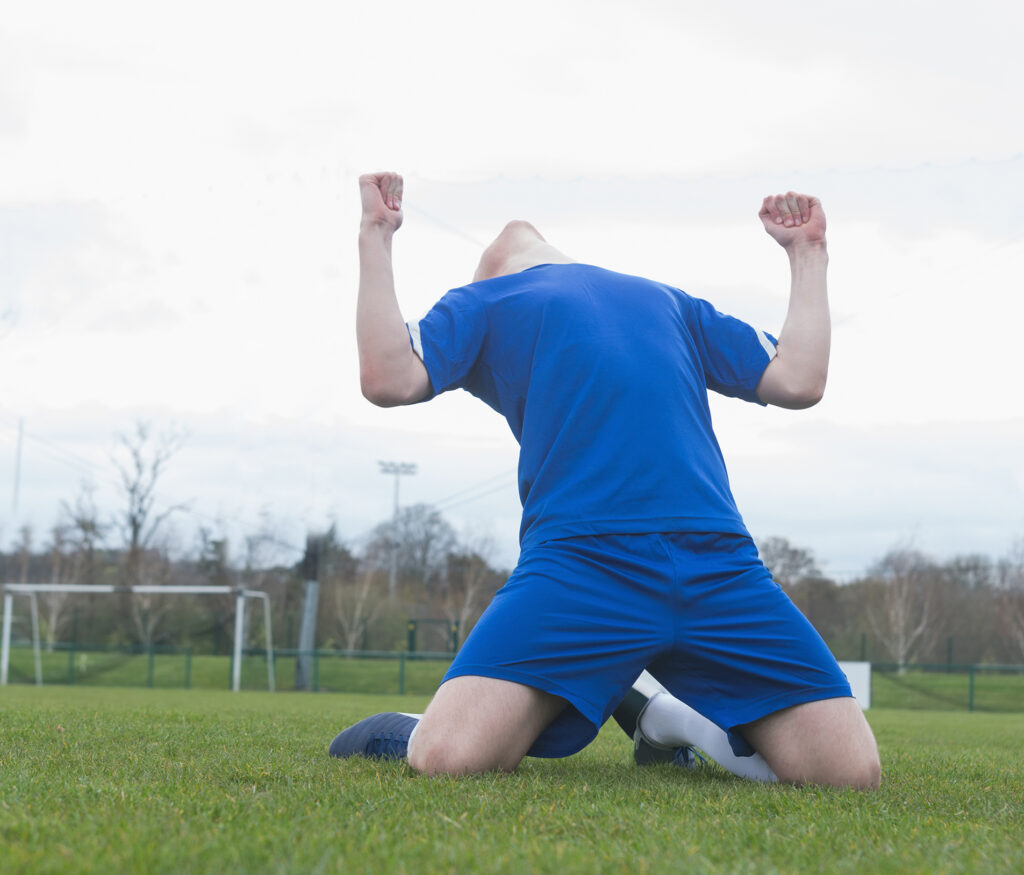 Grassroots Football Player Celebration