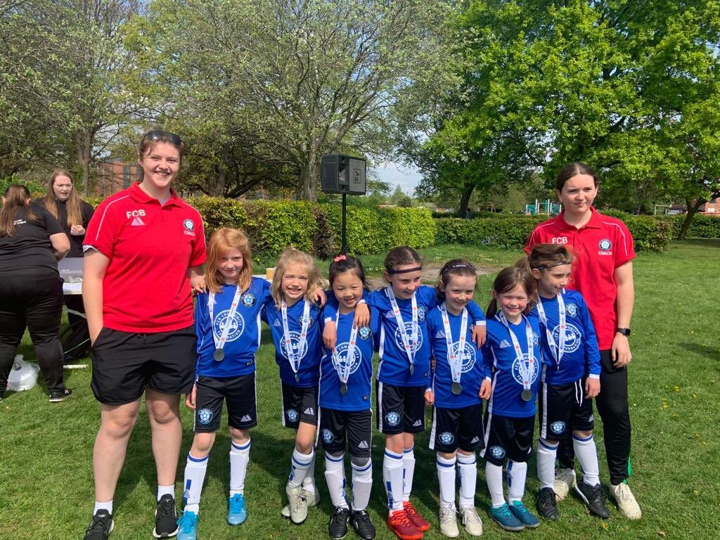 FC Bluestar U7 Girls with their medals