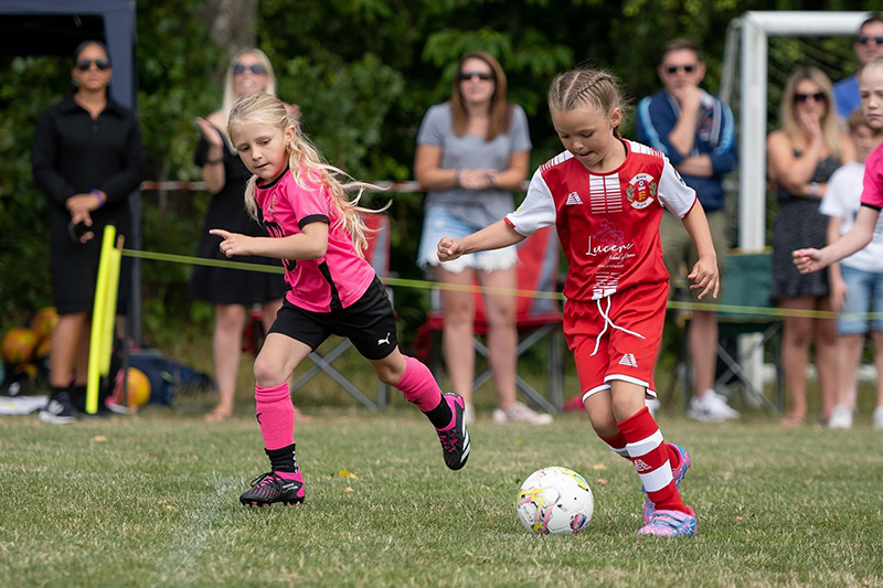 Parents in youth football - parents watching a a youth football match