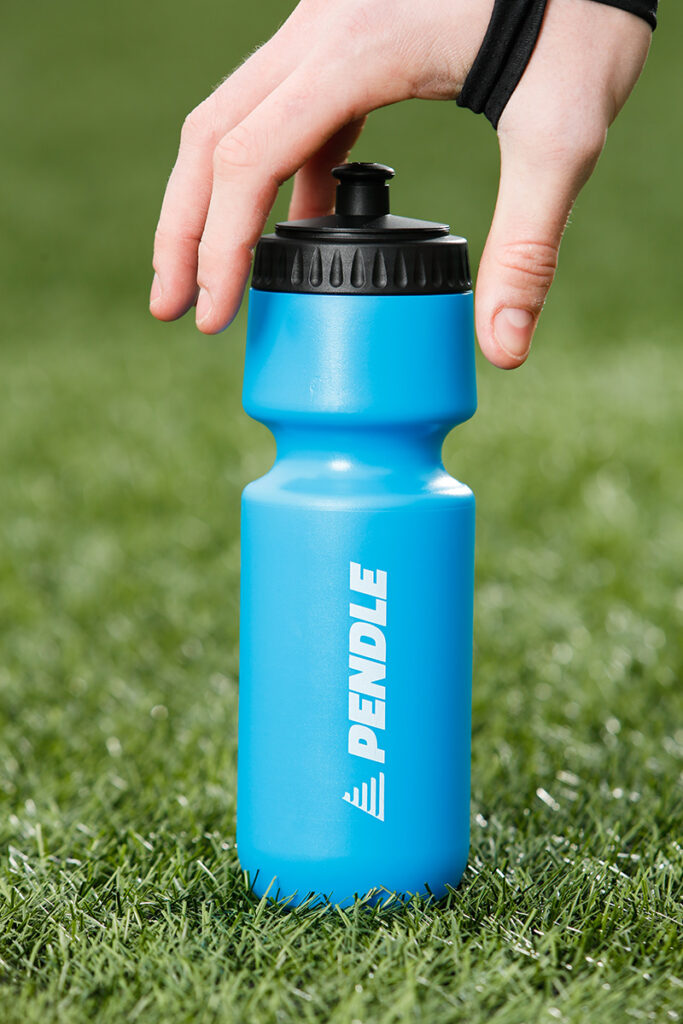 Football Player Holding Water Bottle