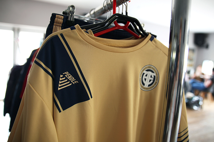Verona football kit in gold/navy on the set of Realness With A Twist