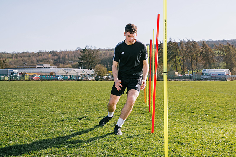 Football warm up - slalom poles