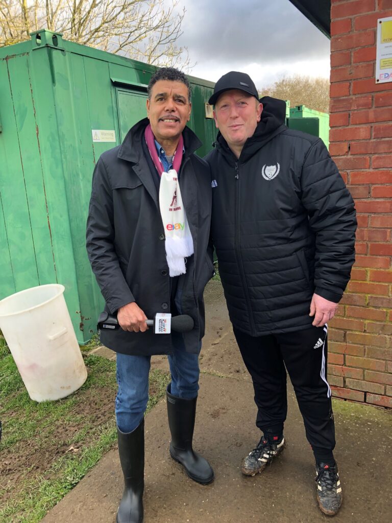 Club member from Harlescott Rangers wearing a Pendle Vulcan Thermal Jacket poses next to Kris Kamara