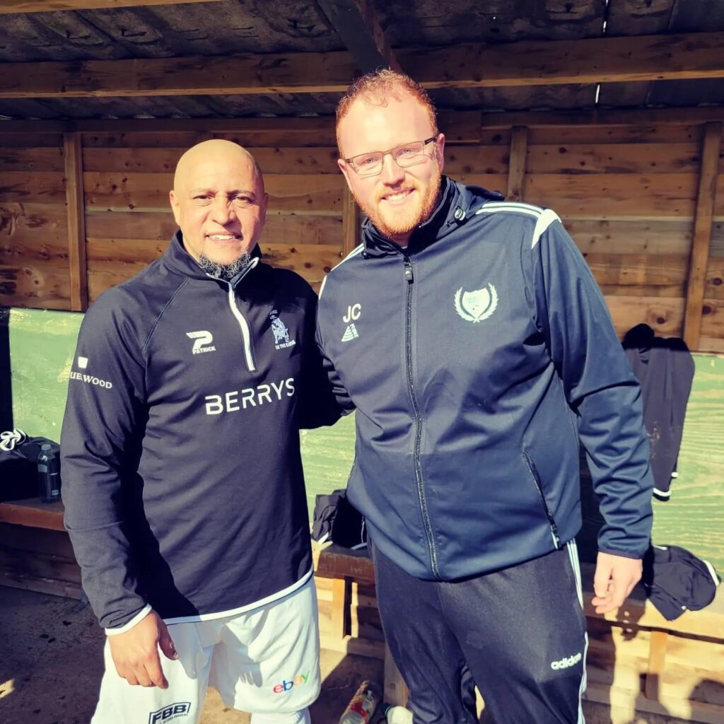 Managers from Harlescott Rangers wearing a Pendle Atlanta Tracksuit poses next to Roberto Carlos