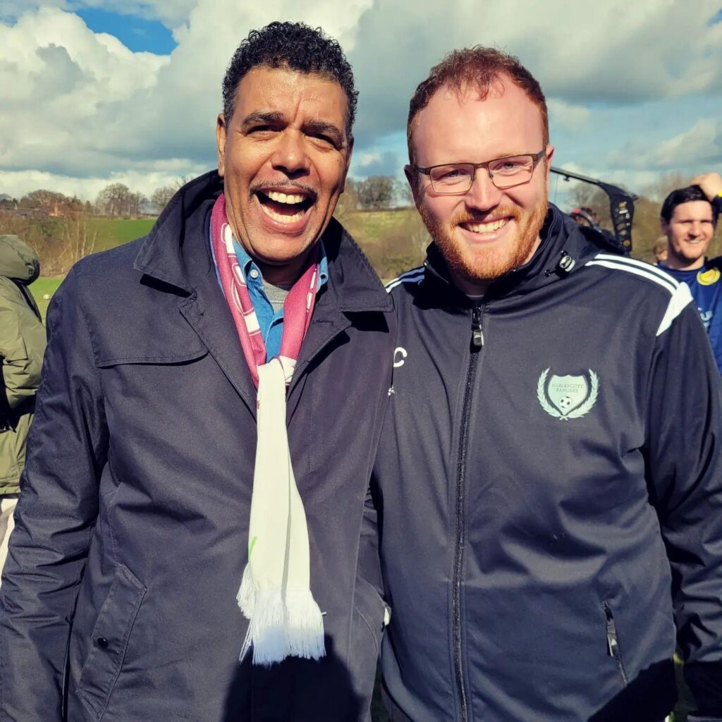 Manager of Harlescott Rangers poses next to Kris Kamara wearing a Pendle Atlanta Tracksuit Top